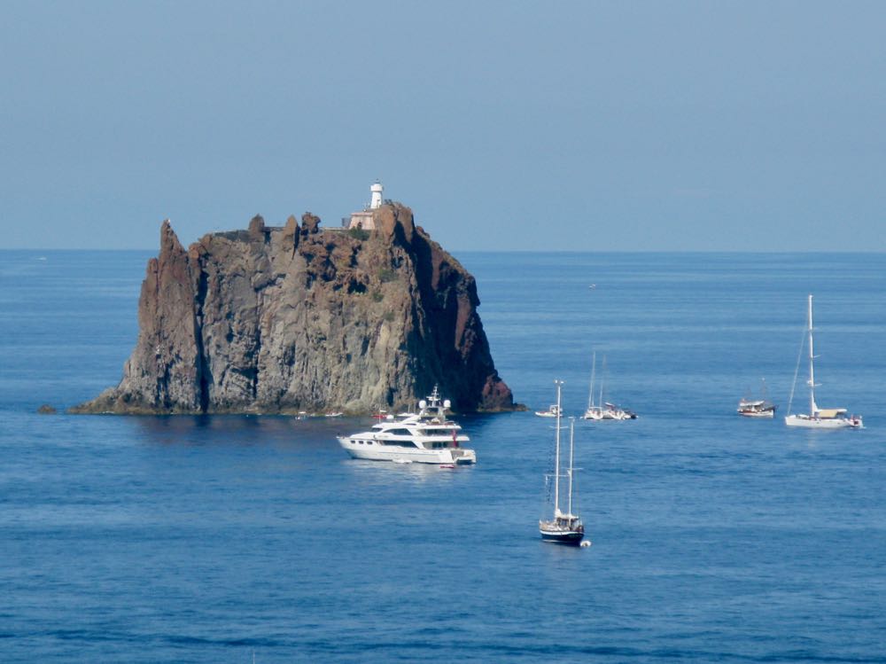 Strombolicchio Lighthouse and Boats