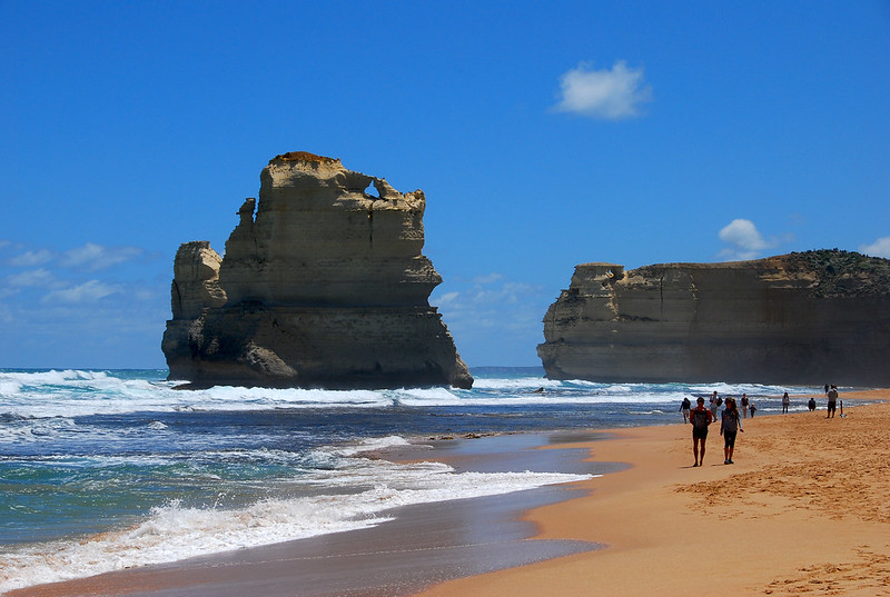 Walking on beach near one of the Twelve Apostles