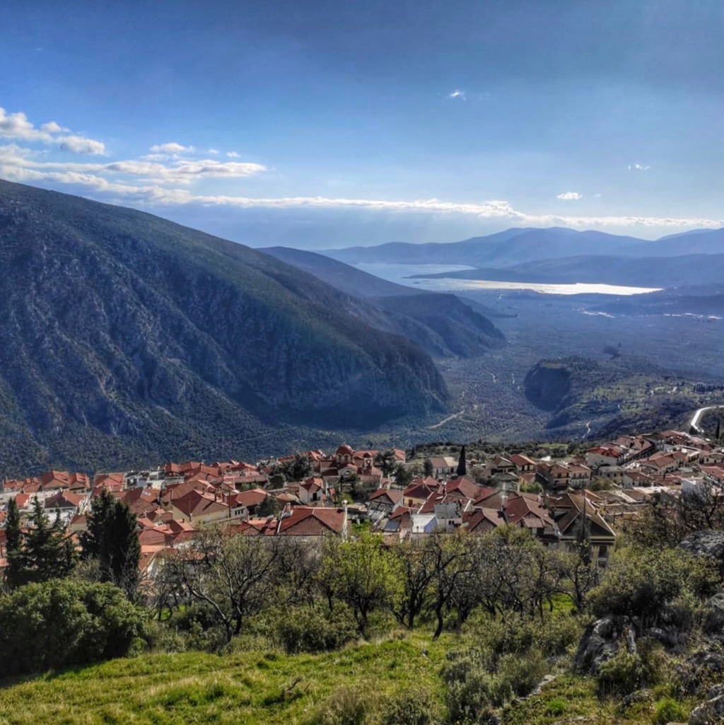 View over Delphi Town rooftops to the Corinthian Gulf near Kirra village