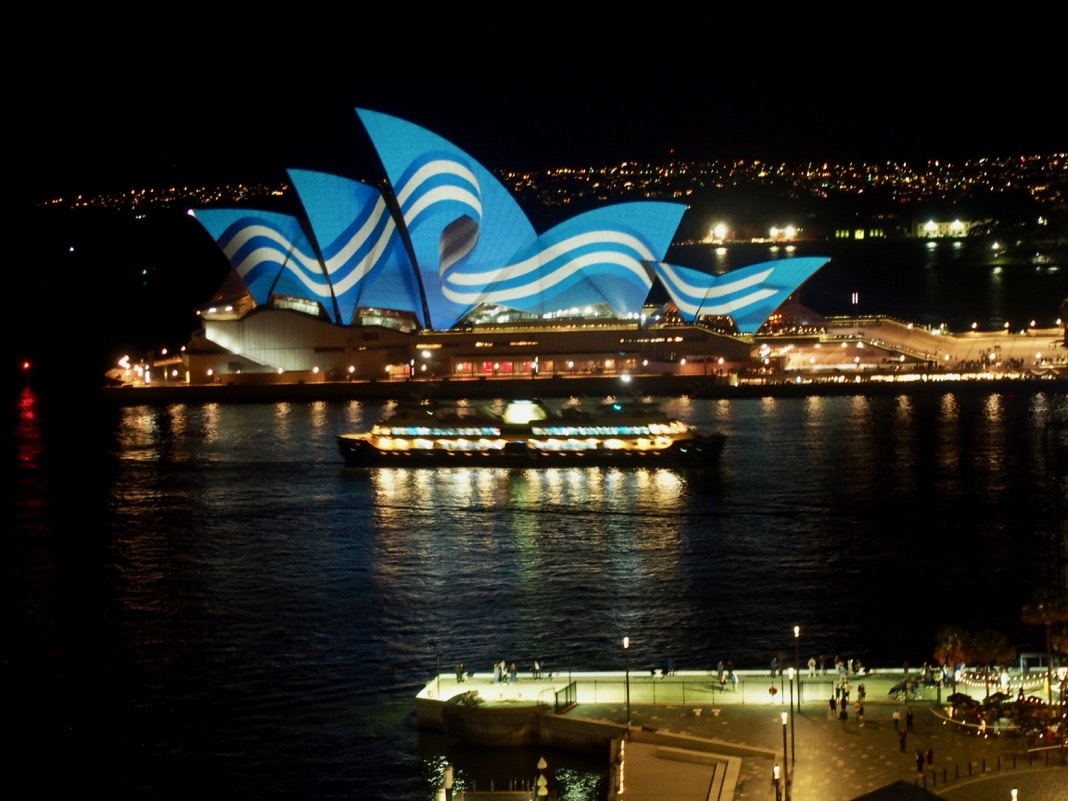 Ferry cruising past Sydney Opera House