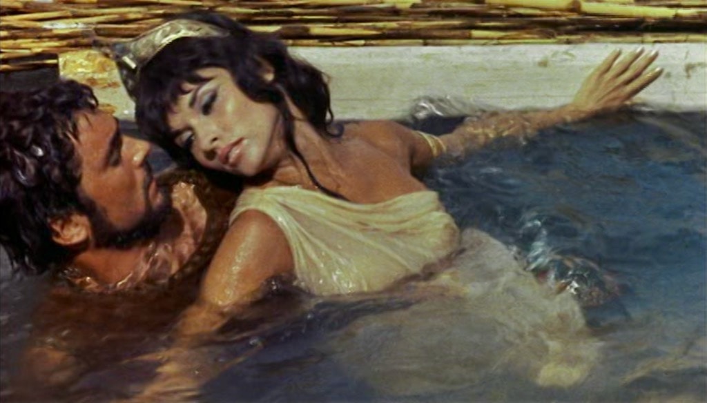 Medea rescued from the sea by Jason after shipwreck in Jason and the Argonauts movie scene