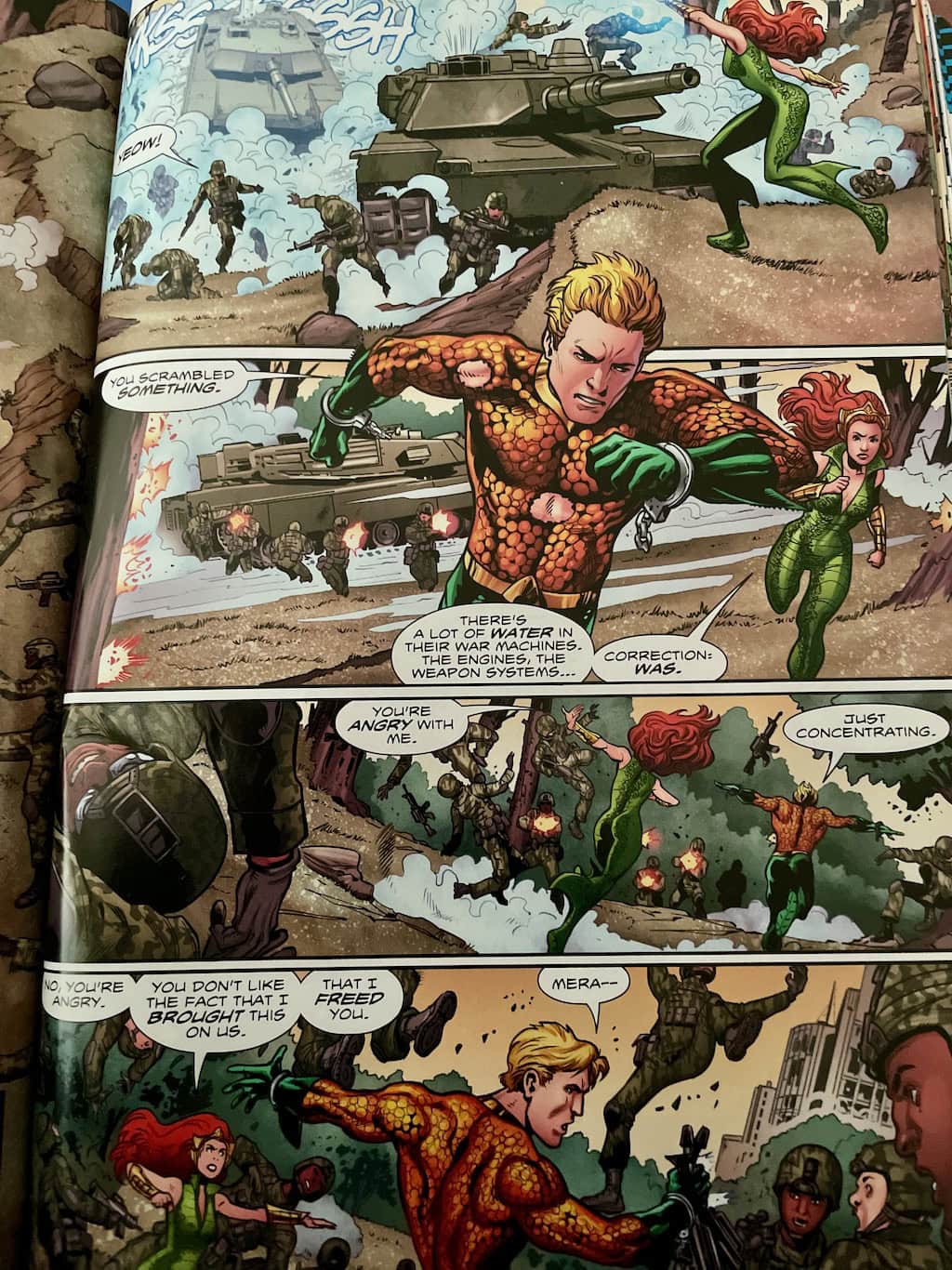 Army attacking Aquaman and Mera