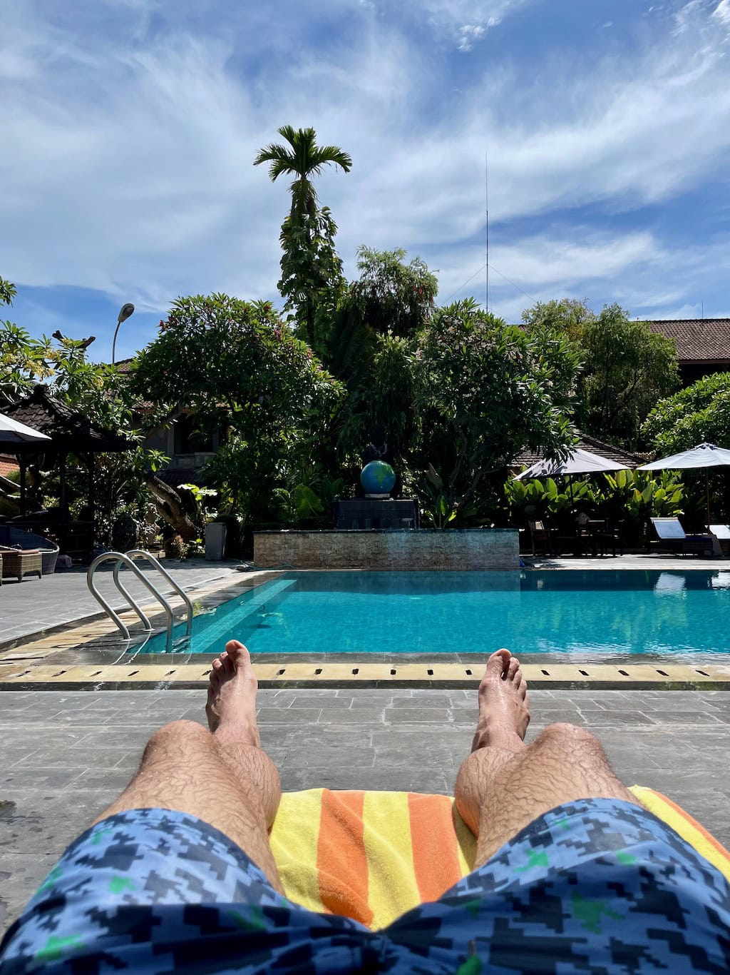 Relaxing by the Pool at Kuta Hotel Satriya Cottages