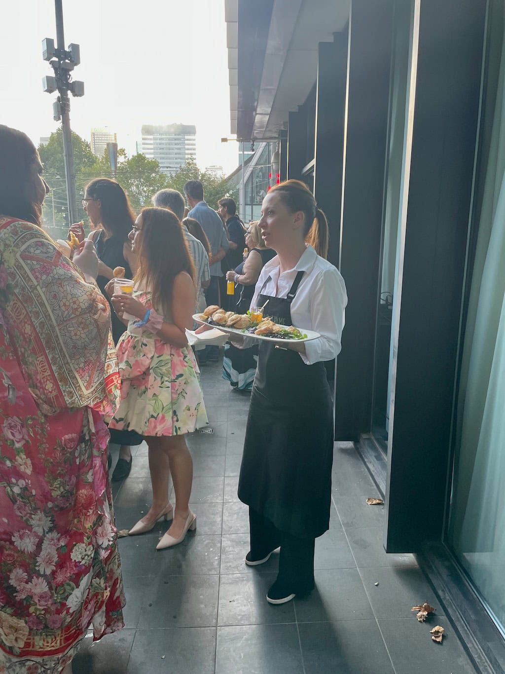 Waitress Serving Food Antipodes Cocktail Party Event