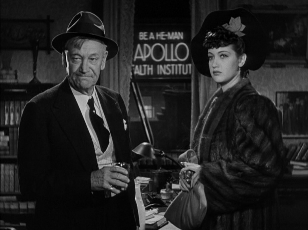 Johnny Apollo 1940 Film Scene Lucky Dubarry and Emmett T Brennan with Apollo Billboard in Background