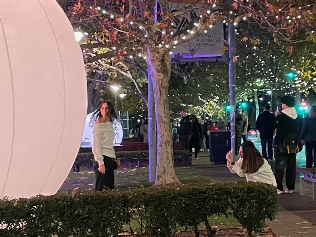 Illuminate Adelaide City Lights Girls taking photos