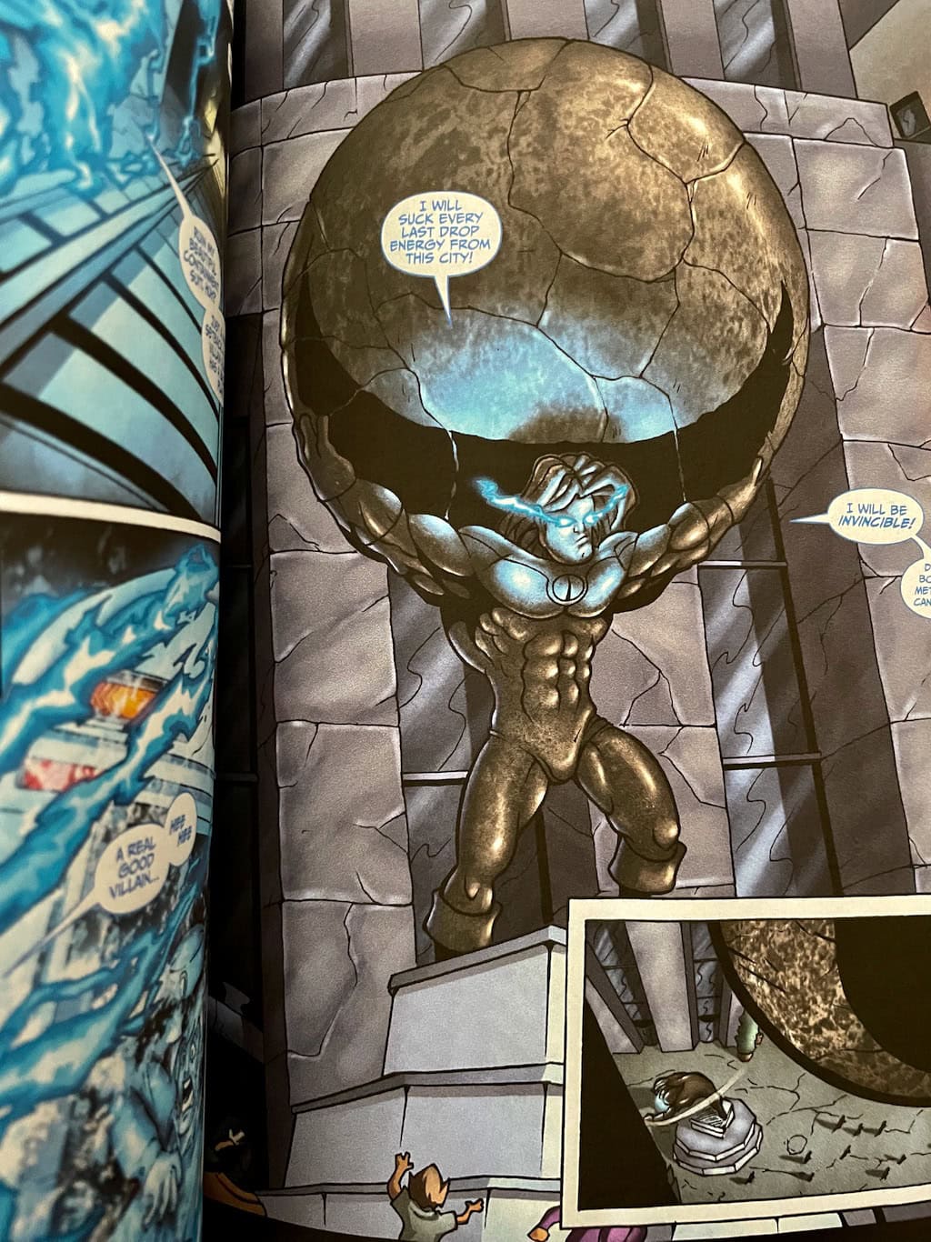 Camelot and Zeus Comic Atlas holding World