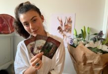 Watch Jaimilee’s Oracle & Tarot Video Reading Jaimilee holding Oracle Tarot Cards